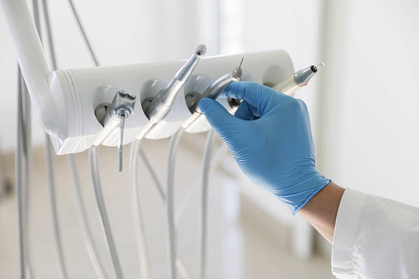 Professional Tooth Extraction technician working in Lake Village, AR